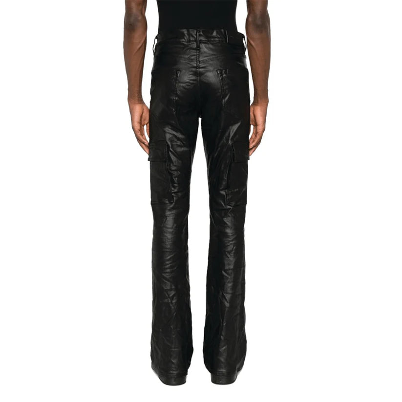 Black leather pants worn by a person on a white background