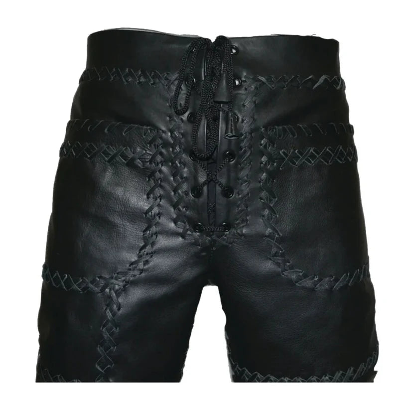 Black leather shorts with intricate stitching on a white background
