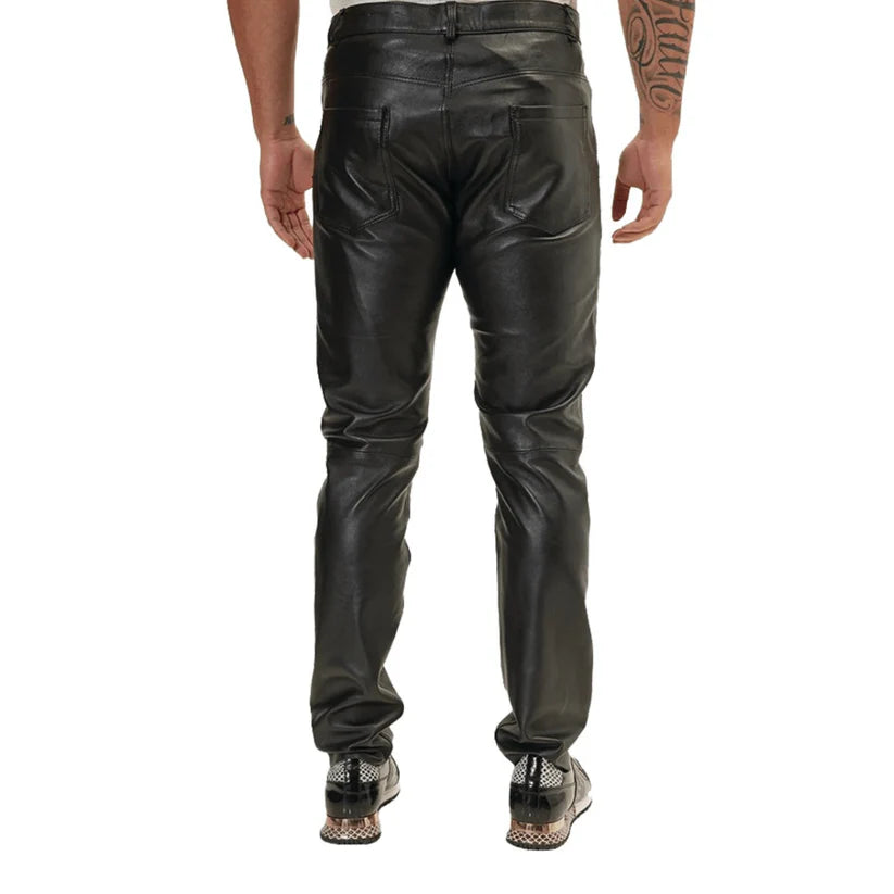 Black leather pants worn by a person on a white background