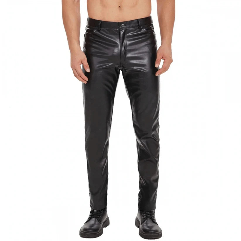 Person wearing shiny black pants on a white background