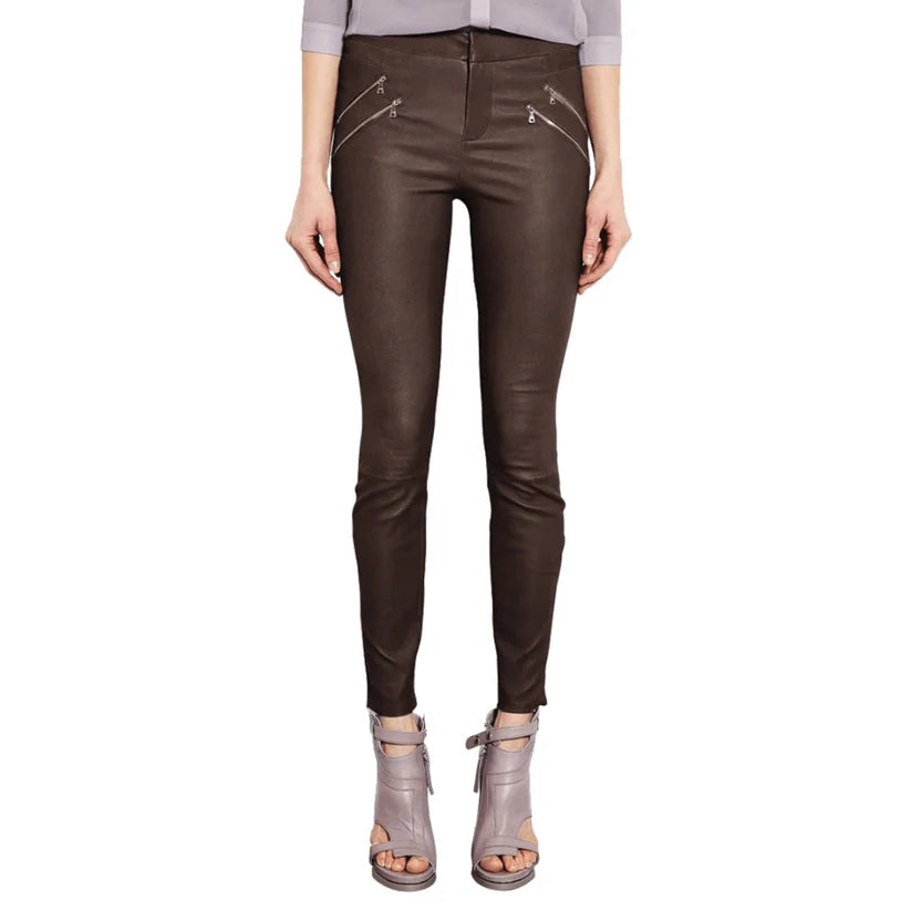 Brown leather pants worn by a person on a white background